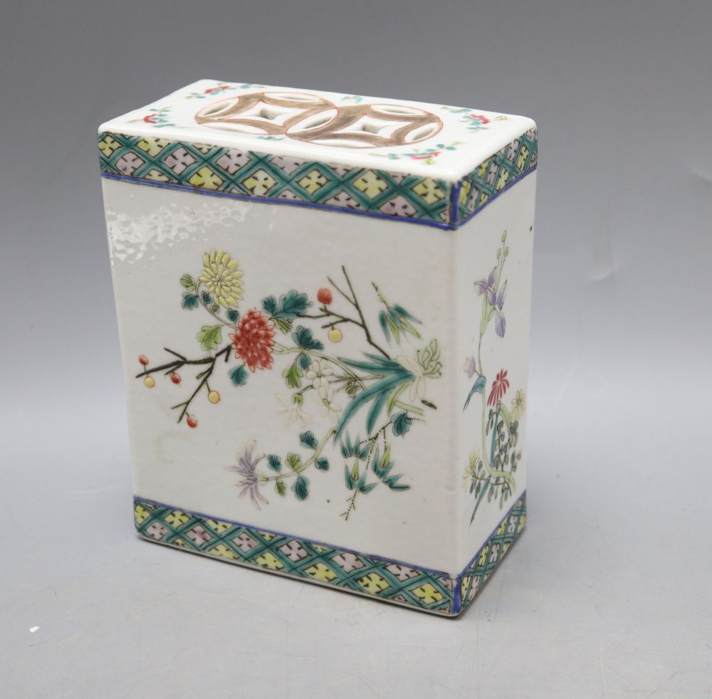 A Chinese famille rose pillow, late 19th century, height 15cm